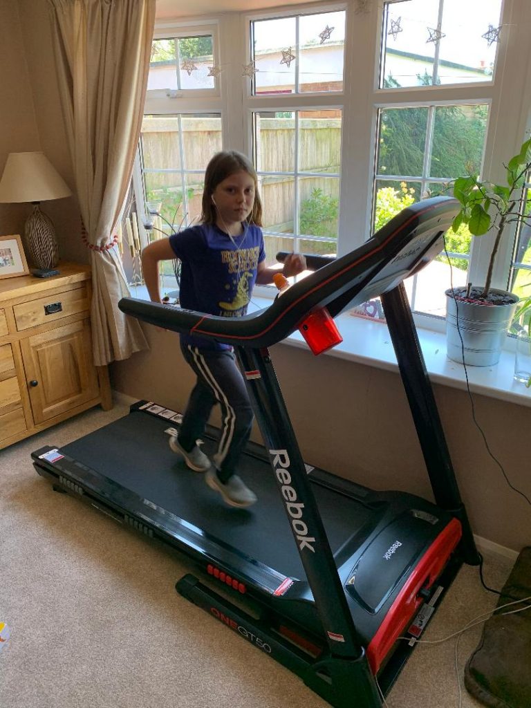 Imogen running on her treadmill at home